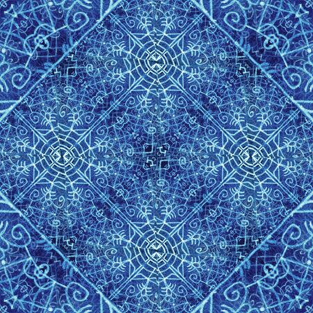 Digital collage technique sacred motif ornate seamless background pattern design in blue colors.