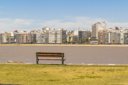 Urban cityscape view of river plate river and skyline against blue sky in Pocitos beach, Montevideo Uruguayの写真素材