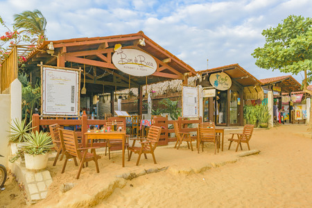 JERICOACOARA, BRAZIL, DECEMBER - 2015 - Sand street with rustic style restaurants in Jericoacoara, Brazilのeditorial素材