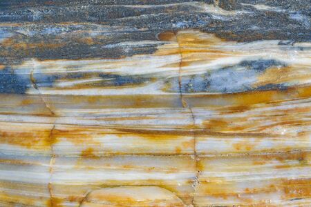 Top view of colored rock texture located in Jericoacoara Brazil