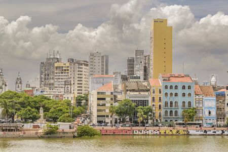 RECIFE, BRAZIL, JANUARY - 2016 - Cityscape view of eclectic style buildings at riverfront in Recife...