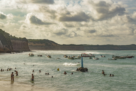 PIPA, BRAZIL, JANUARY -  2016 - Summer scene with people at beach in Pipa, a touristic watering place located in Brazil, South Americaのeditorial素材