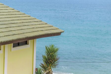 Detail view of roof of elegant waterfront house at top of hill in Tibau do Sul, a watering place located in Brazilの写真素材