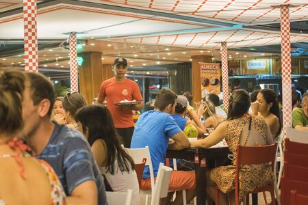 RIO DE JANEIRO, BRAZIL, JANUARY - 2016 - Night scene at waterfront bar in Copacabana, Rio de Janeiro, Brazilのeditorial素材