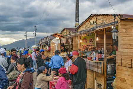 QUITO, ECUADOR, FEBRAURY - 2016 - People at ecuadorian food street market stands located in the famous panecillo landmark in Quito, Ecuador.のeditorial素材