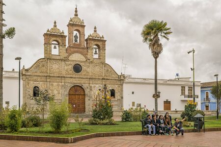 RIOBAMBA, ECUADOR, FEBRUARY - 2106 - Group of young people taking a selfie at maldonado square located at historic center of Riobamba city in Ecuador.のeditorial素材