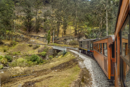 ALAUSI, ECUADOR, OCTOBER - 2015 - Train trip which goes to the famous Nariz del Diablo rocky mountain, located in Aluasi town, Ecuadorのeditorial素材