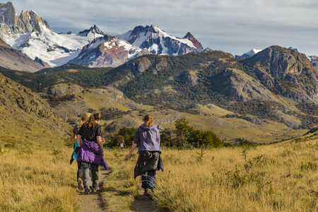 Three european tourist walking at one of the trekking road at El Chalten. Patagonia -  Argentinaのeditorial素材