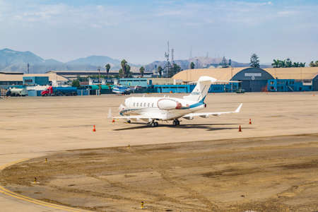 LIMA, PERU, APRIL - 2016 - Small plane parked at Jorge Chavez airport in Lima city, Peru