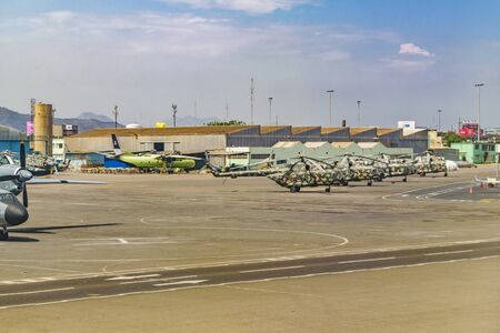 LIMA, PERU, APRIL - 2016 - Military helicpoters parked at Jorge Chavez airport in Lima city, Peruのeditorial素材