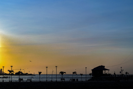 Tropical urban scene at malecon in La Libertad, a coastal city located in Ecuador, South America