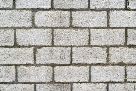 Grey brick wall background texture