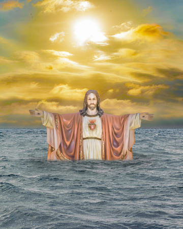 Religious chrisitan background artwork with jesuschrist emerging from the waters against sunset sky backgroundの写真素材