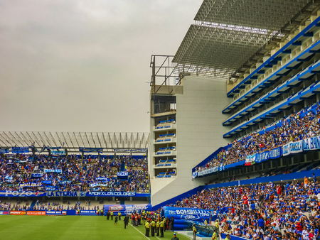 GUAYAQUIL, ECUADOR, NOVEMBER - 2016 - Crowded grandstand at soccer match between Emelec against Liga de Quito playing at the George Capwell Stadium in Guayaquil city, Ecuador.のeditorial素材