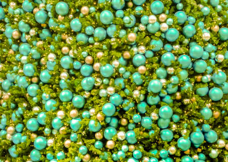Detail view of christmas tree with turquoise and silver balls ornaments