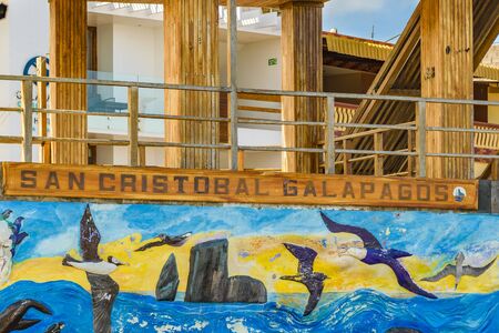GALAPAGOS, ECUADOR, AUGUST - 2016 - Wood construction and "San Cristobal Galapagos" text signpost at Galapagos Islands, Ecuadorのeditorial素材