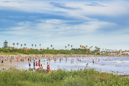MONTEVIDEO, URUGUAY, JANUARY - 2016 - Crowded urban beach at punta gorda neighborhood, Montevideo, Uruguayのeditorial素材