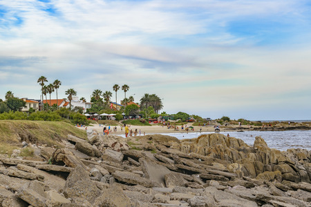 MONTEVIDEO, URUGUAY, JANUARY - 2016 - Crowded urban beach at punta gorda neighborhood, Montevideo, Uruguayのeditorial素材