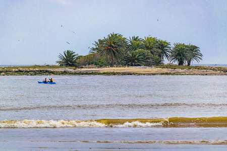 MONTEVIDEO, URUGUAY, JULY - 2016 - Peopl kayaking near shore of beach in Montevideo city, Uruguayのeditorial素材