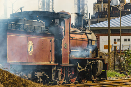 MONTEVIDEO, URUGUAY, AUGUST - 2016 - Old train in motion in Montevideo city, Uruguayのeditorial素材