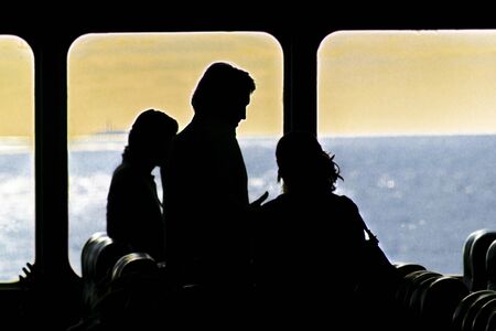 Interior scene with people leaving the ferry at Colonia city, Uruguayの写真素材