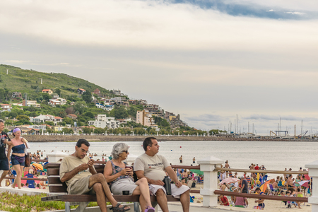 PIRIAPOLIS, URUGUAY, FEBRUARY - 2016 - Crowded waterfront boardwalk at Piriapolis city, Uruguayのeditorial素材