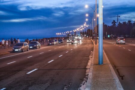 MONTEVIDEO, URUGUAY, FEBRUARY - 2016 - Urban night scene at coastal avenue at Montevideo city, Uruguayのeditorial素材