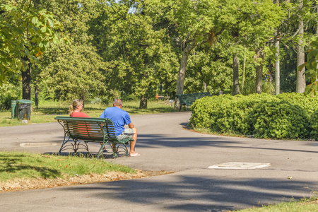 MONTEVIDEO, URUGUAY, MARCH - 2016 - Adult couple sitting at park in botanical garden of Montevideoのeditorial素材