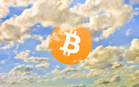 Conceptual financial background with bitcoin icon rising at skyの写真素材