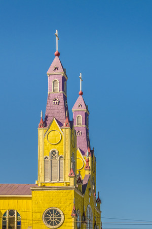 Exterior detail facade of famous wooden catholic church at Castro city, Chiloe Island, Chileの写真素材