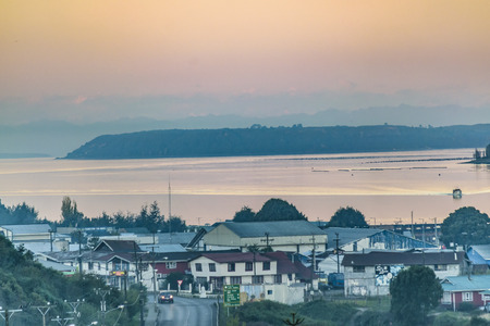 Lake and hill landscape scene at chiloe island, chileの写真素材