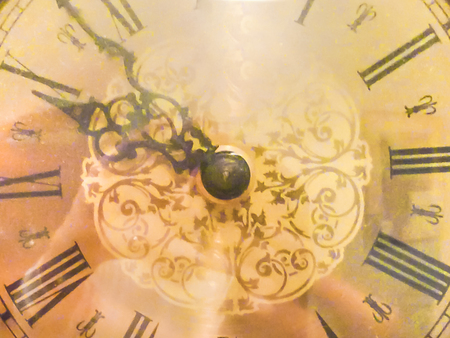 Close up detail view old wall clock vintage style backgroundの写真素材