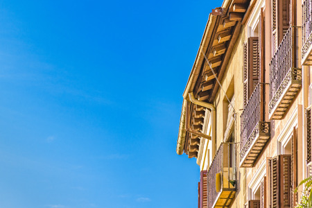 Low angle view of eclectic style apartment building at Madrid city, Spain