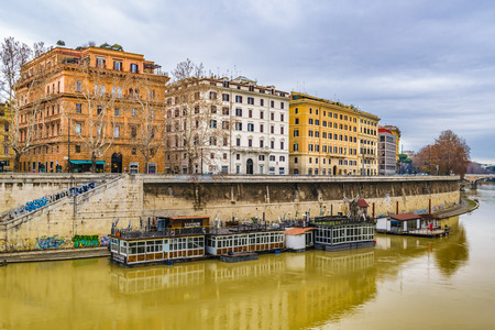 ROME, ITALY, DECEMBER - 2017 - Urban day winter season scene at tiber river with apartment buidings at background, Rome, Italyのeditorial素材