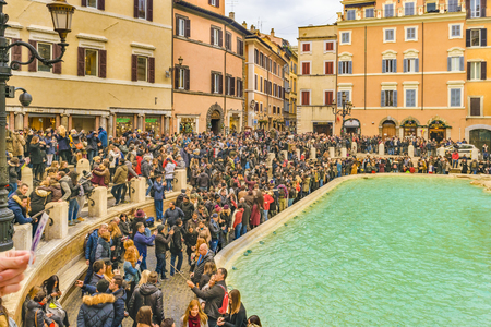 ROME, ITALY, JANUARY - 2018 - Crowded urban scene at fontana di trevi, the most famous fountain of Rome city, Italyのeditorial素材
