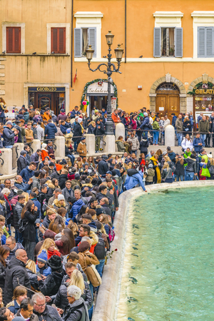 ROME, ITALY, JANUARY - 2018 - Crowded urban scene at fontana di trevi, the most famous fountain of Rome city, Italyのeditorial素材