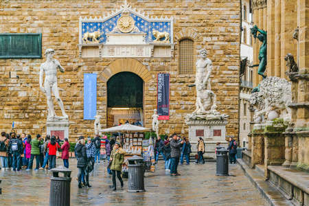 FLORENCE, ITALY, JANUARY - 2018 - Winter rainy urban day scene at famous piazza della signoria...
