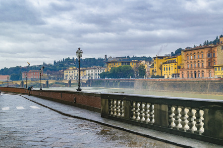 Historic center cityscape of florence with arno riverfront buildings as main subjectの写真素材