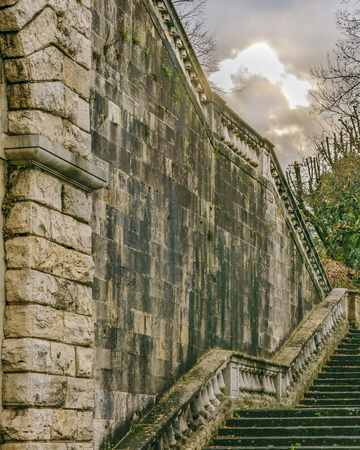 Ancient stone stairs which goes to san miniato al monte basilica in florence city, Italyの写真素材