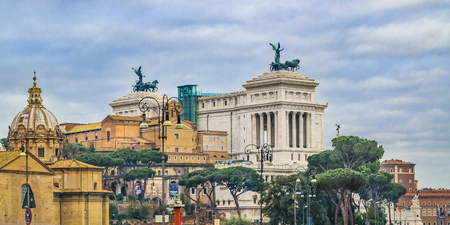Urban winter scene with famous Vittorio Emanuele II monument building as main subject.のeditorial素材