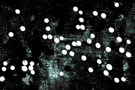 Dotted grunge abstract texture background in white and cyan dark tonesの写真素材