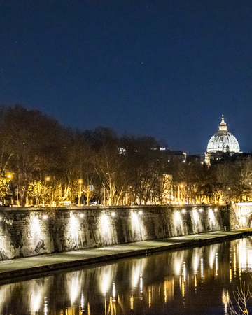 Urban cityscape night winter season scene at tiber river in Rome city, Italyのeditorial素材