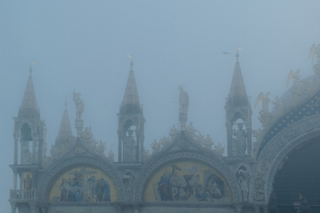 VENICE, ITALY, JANUARY - 2018 - Winter foggy scene detail view of san marcos cathedral at piazza san marcos in venice city, Italyのeditorial素材