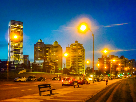 MONTEVIDEO, URUGUAY, MARCH - 2018 - Night urban scene at famous boardwalk walk at coastal buceo neighborhood in montevideo city, Uruguayのeditorial素材