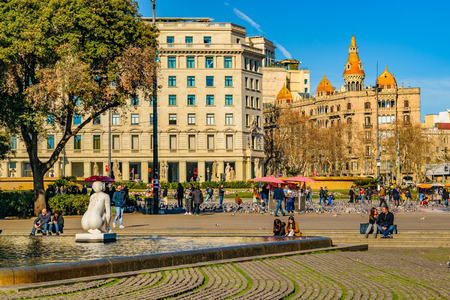 BARCELONA, SPAIN, JANUARY - 2018 - Urban winter day scene at famous catalunya square at barcelona...