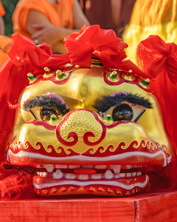 Lion head over table at chinese new year celebration celebrated in the city of montevideo, uruguayのeditorial素材