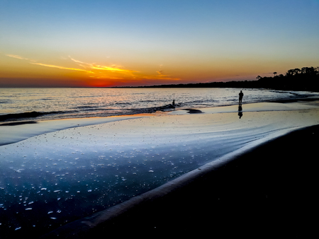 Silhouette sunset scene at atlantida beach, Canelones district, Uruguayの写真素材