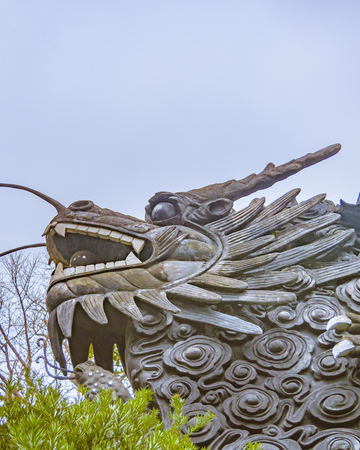 SHANGHAI, CHINA, DECEMBER - 2018 - Sixteenth century wooden dragon sculpture at yuyuan garden, shanghai, chinaのeditorial素材