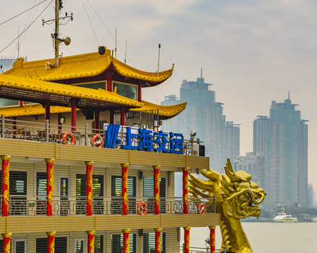 SHANGHAI, CHINA, DECEMBER - 2018 - Ancient chinese touristic cruise at famous the bund zone in shanghai city, chinaのeditorial素材