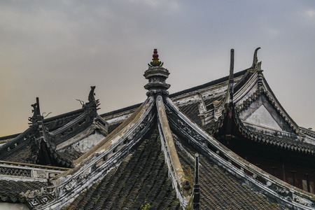 SHANGHAI, CHINA, DECEMBER - 2018 - Wooden ornamented roof antique chinese style architecture detailのeditorial素材